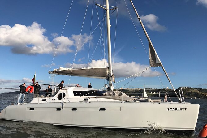 2H Tour on a Private Sailing Catamaran "Scarlett" up to 16 people - Why Lisbon looks better from the Tagus