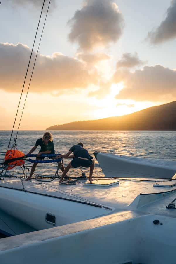Airlie Beach: 2-Day Whitsunday Islands Sailing Snorkel Tour - Sunset sailing and the choice between action and rest