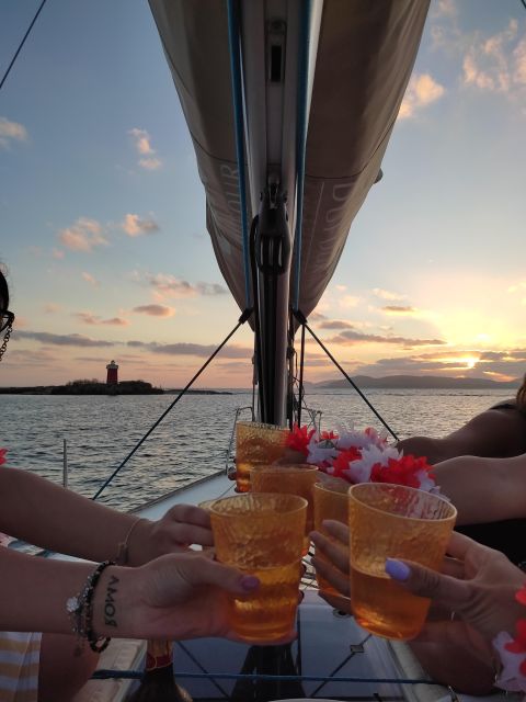 Alghero: Sunset Sailing Aperitif Experience - Sunset, music, and the social side