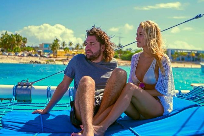 Aruba Sunset Sail Cruise Aboard The Dolphin Catamaran - The swim stop, rope swing, and waterslide