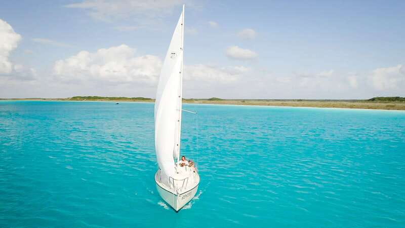 Bacalar: Group Sailing Trip with Swimming and Drinks - Drinks, fruit, and the practical value of $40