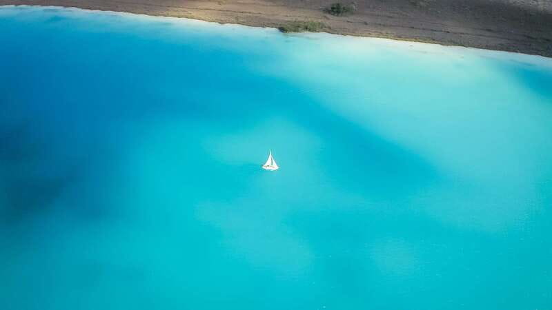 Bacalar: Private Sailboat Tour with Lagoon Swimming - The abandoned hotel and the lagoon’s human story