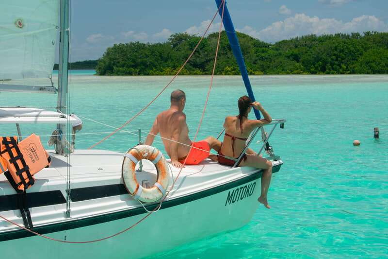 Bacalar: Private Sailboat Tour with Lagoon Swimming - What the guides add to the day