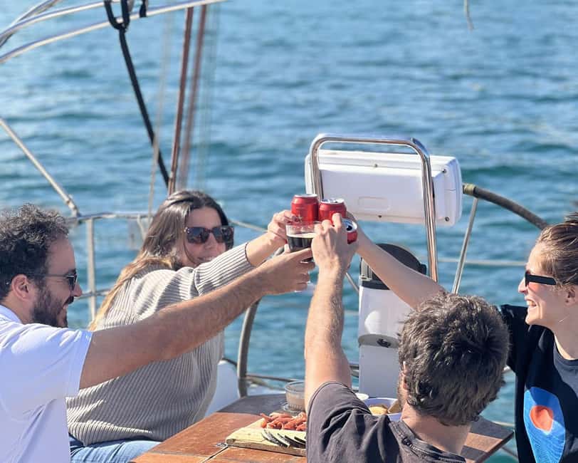 Barcelona: Sailing with Open Bar, Catalan Snack & Swim Stop - Leaving Marina Vela near Barceloneta