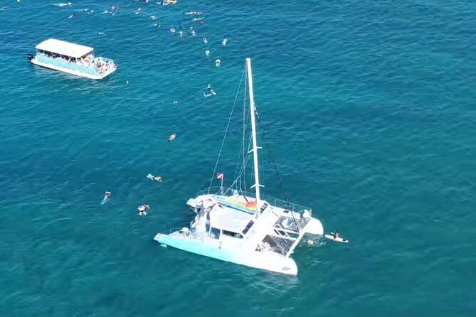 Board from Waikiki Beach for Aloha Hour Sail on Hāwea Catamaran - Drinks, mocktails, and the value of the $55.35 price