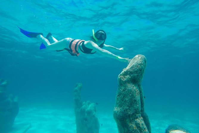 Cancun Half-Day Sailing Catamaran Cruise to Isla Mujeres - Open Bar, Snacks, and the Party Mood