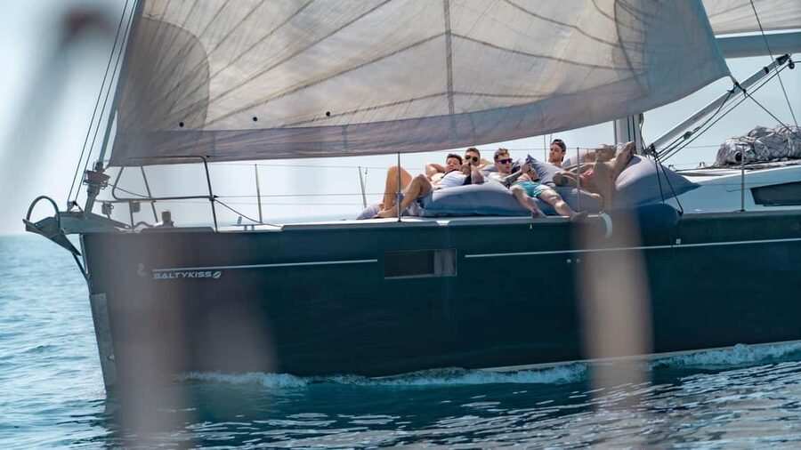 Catania: Sail Tour of Cyclops Coast with Sicilian Aperitif - Aci Castello from the water
