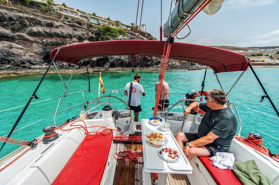 Fuerteventura: Sailing with Snorkeling and Dolphin Watching - Tapas, local food, and a drink on deck