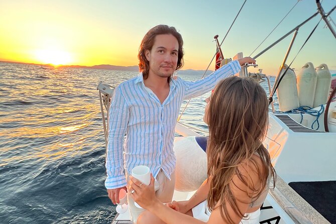Full Day, Half Day, or Sunset Sailing Cruise with Tapas & Drinks - Swimming, snorkeling, and paddleboarding in a bay