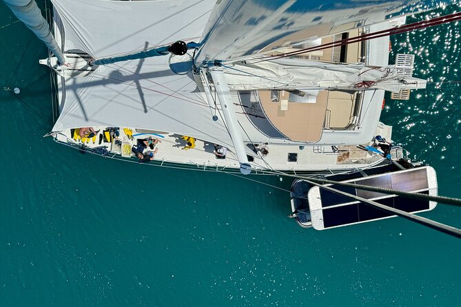 Full Day Low Isles Sailing & Snorkelling Cruise from Port Douglas - Snorkeling, glass-bottom views, and time to rest