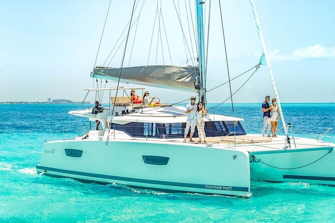 Half Day Luxury Sailing Experience in Riviera Maya with Open Bar - Paddleboards, swimming, and time near the boat