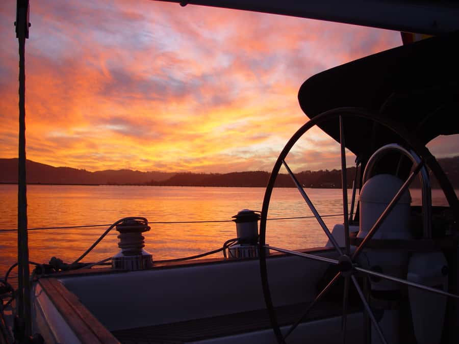 Knysna Sunset Sailing Cruise with Light Dinner and Wine - Sailing toward the Knysna Heads