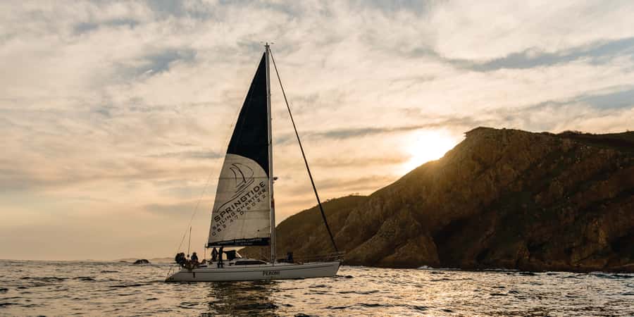 Knysna Sunset Sailing Cruise with Light Dinner and Wine - Sunset snacks and South African Cap Classique