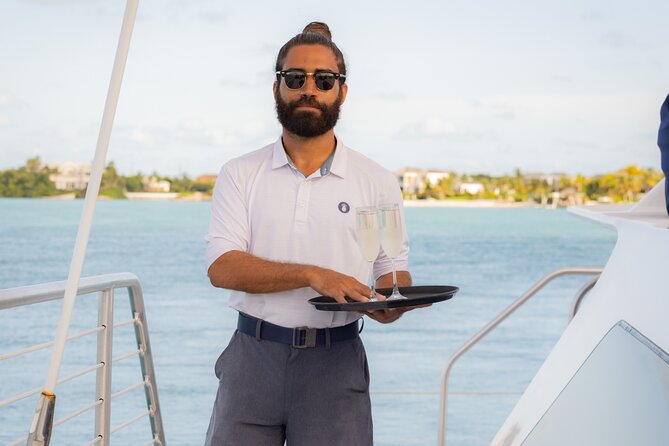 Lady Grace Signature Catamaran Sunset Sail from Ritz-Carlton - A first glass of champagne and a full bar
