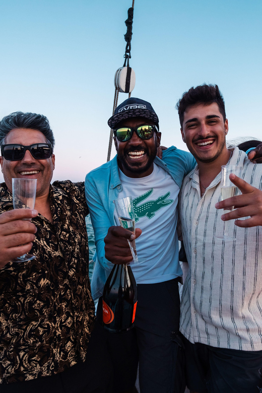 Lagos: Sunset Sail aboard a Traditional Boat with Prosecco - Sunset, cliffs, and the timing of the Prosecco