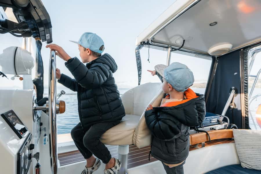 Lake Taupo: Luxury Sailing Catamaran to Māori Rock Carvings - A swim in fresh lake water