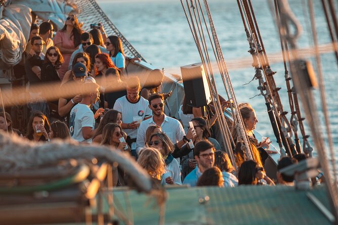 Lisbon Boat Party BIGGEST Sunset Cruise — with Music & Drinks - Ribeira das Naus and the central waterfront