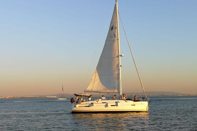 Lisbon Private Sailing Cruise, drink included (options: 2h, 3h, 4h, 6h or 8h) - Passing Beneath the 25 de Abril Bridge