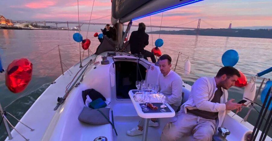 Lisbon: Sailboat Tour w/ Local Guide and Open Bar Green Wine - Meeting the boat beneath the 25 de Abril Bridge