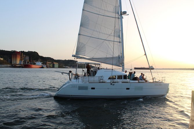 Lisbon Sailing Catamaran Public Cruise with drinks - Praça do Comércio and Lisbon’s first river view