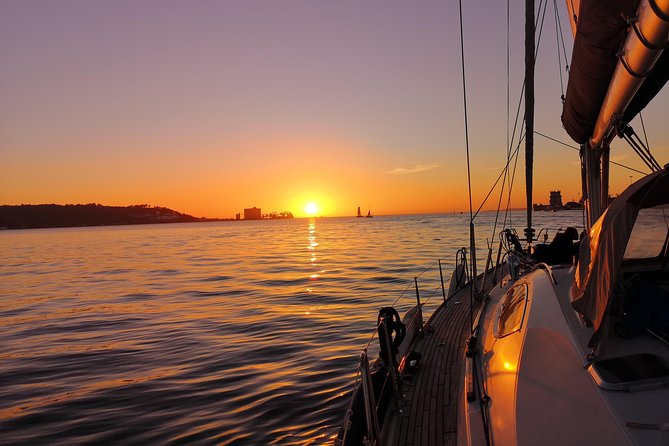Lisbon Sunset Sailing Tour on Luxury Sailing Yacht with 2 Drinks - Lisbon’s central waterfront from the deck