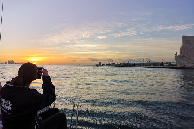 Lisbon Sunset Sailing Tour on Luxury Sailing Yacht with 2 Drinks - Wine, cheese, and the sunset timing