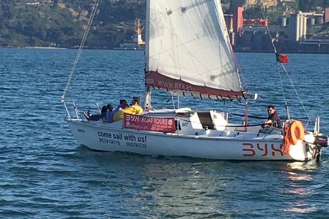 Lisbon Sunset Sailing Tour with White or Rosé Wine and Snacks - The palace and museum along the Tagus