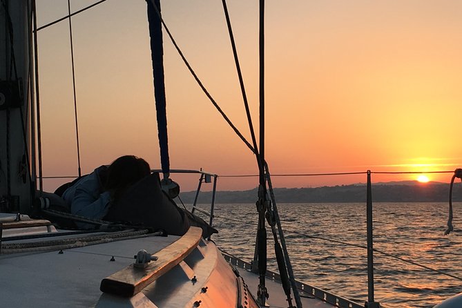 Lisbon Sunset Sailing Tour with White or Rosé Wine and Snacks - Wine, cheese, and the social side of the trip
