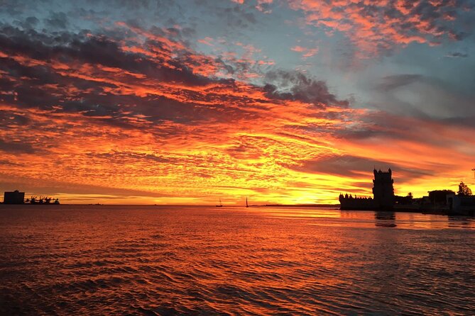 Lisbon Sunset Sailing with Portuguese Wine and History - From the 25th April Bridge to Christ the King