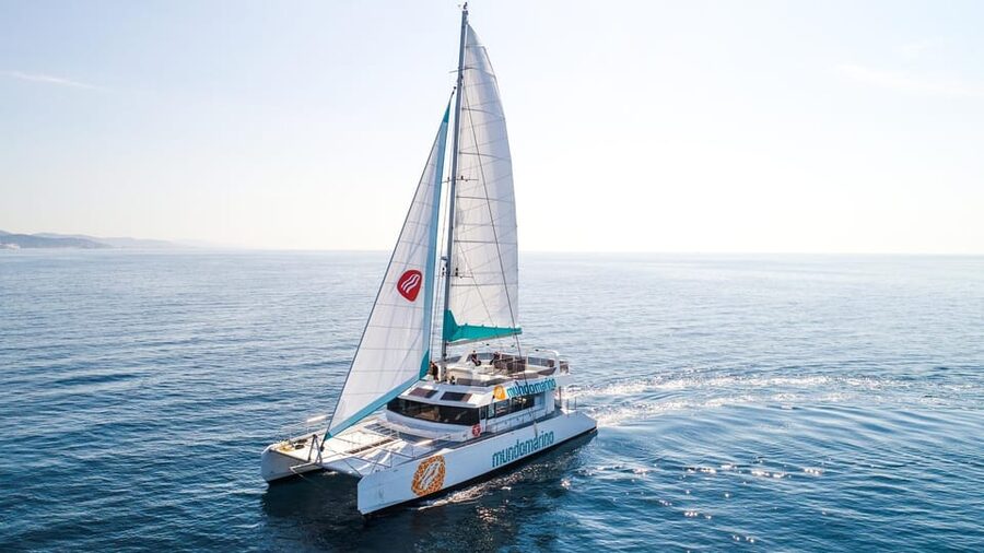 Malaga: Catamaran Sailing Cruise with Swimming & Optional DJ - Music, the DJ option, and the mood onboard