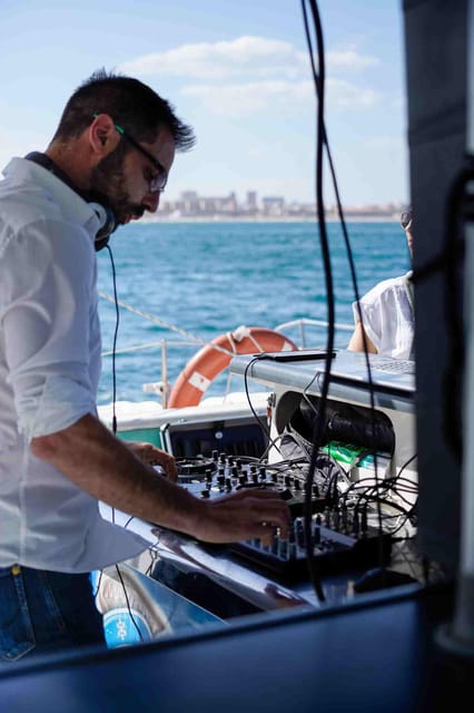 Malaga: Catamaran Sailing Cruise with Swimming & Optional DJ - Drinks, bar service, and what your $23 buys