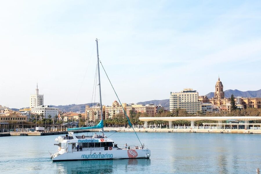 Malaga: Sailing Catamaran with Swimming and Paella Lunch - Sailing away from Malaga’s crowded shoreline