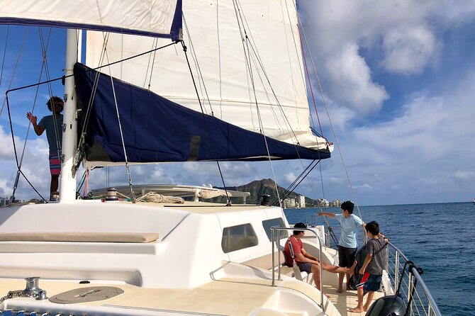 Moana’s Swim’n’Sail Cocktail Cruise Along the Waikiki Coast - Booking, weather, and timing tips