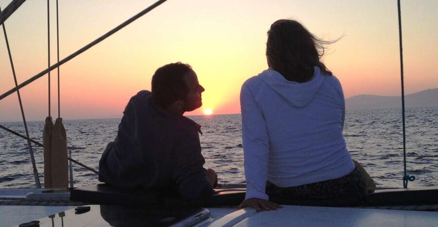 Mykonos: Sunset Sail Cruise to Rhenia, Beach Hopping, Dinner - Sunset on the return to Mykonos
