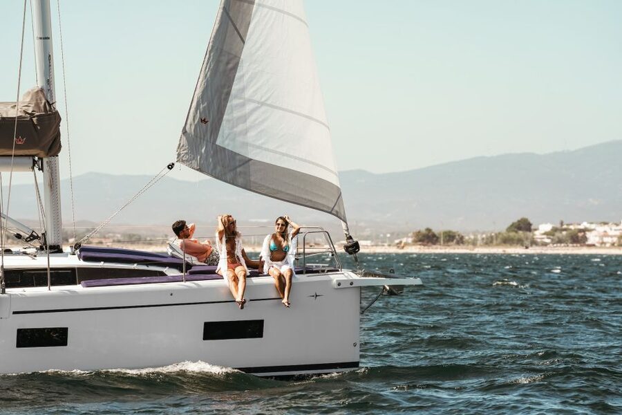 Portimao: Half-Day Sailing Yacht Cruise to the Benagil Caves - Swimming stops and the two paddleboards