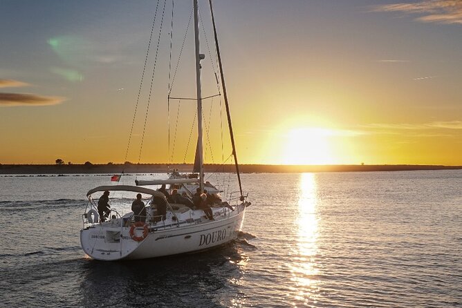 Porto: Sunset or Daytime, Charming Sailboat Cruise on the Douro River - A small sailboat with a big view of Porto