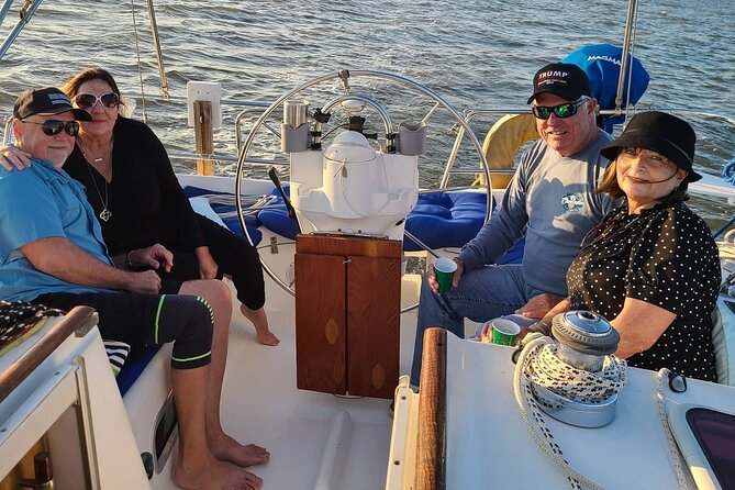 Private Luxury Yacht Charters, BYOB & Dolphins - Dolphins, Sailboats, and Working Harbor Views