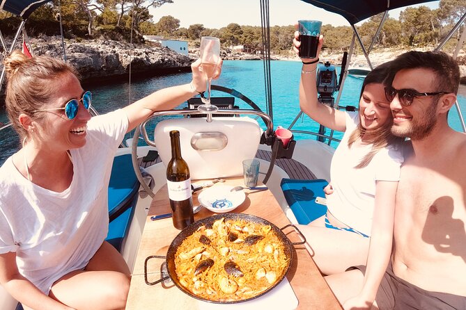 Private sailing with Paella and Tapas in Palma - Swimming, snorkeling, and paddleboarding in a quiet cove