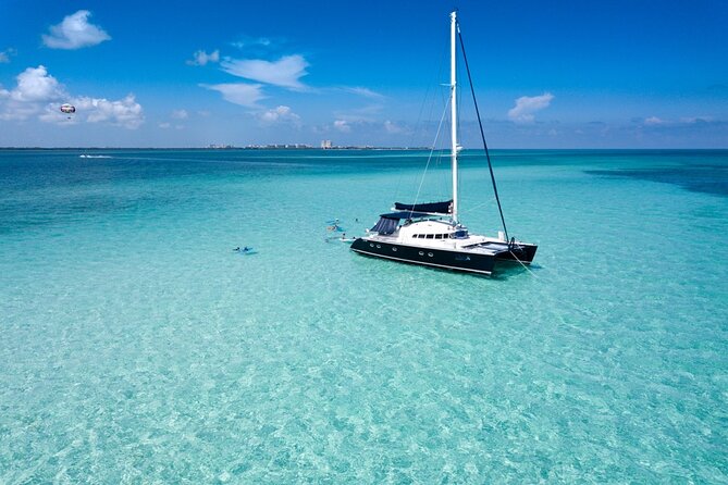Puerto Morelos Secret Sandbar Catamaran Sail - Standing in the shallow water at the National Reef Park