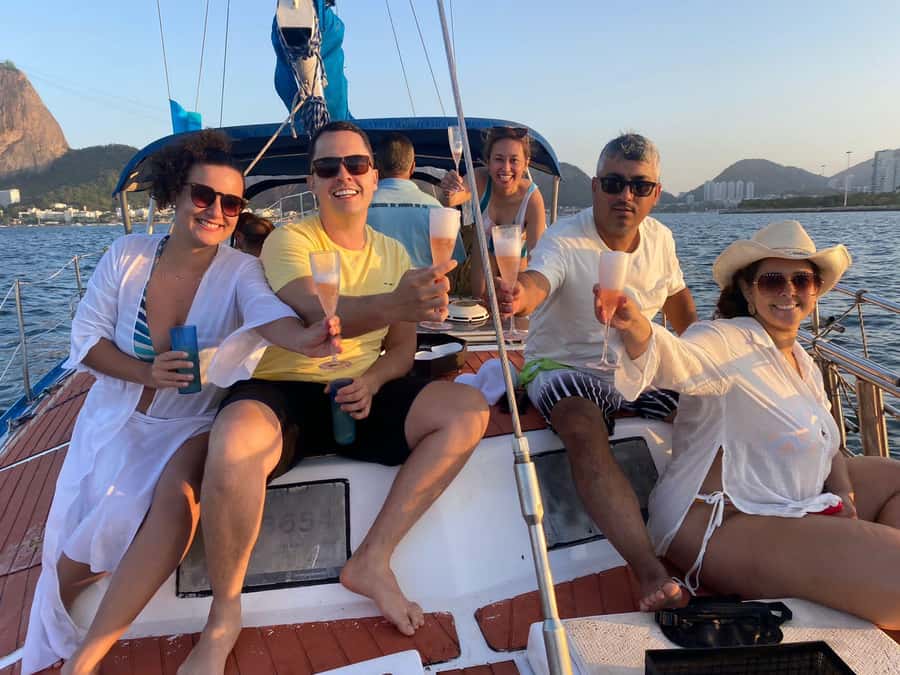 Rio de Janeiro: Sunset Sailboat Tour with Open Bar - Snacks, caipirinhas, and the onboard atmosphere