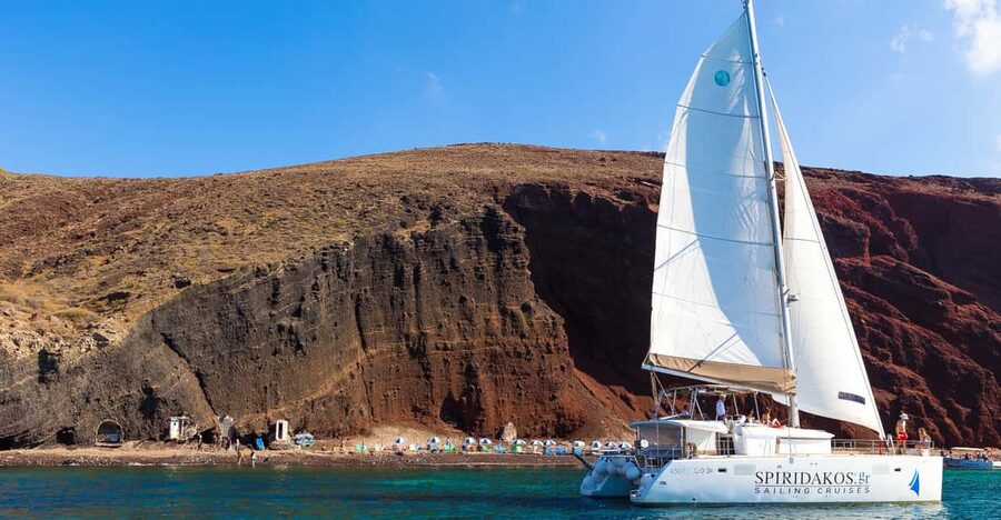 Santorini: Sailing Catamaran Cruise with BBQ and Drinks - Red Beach and the southern coast