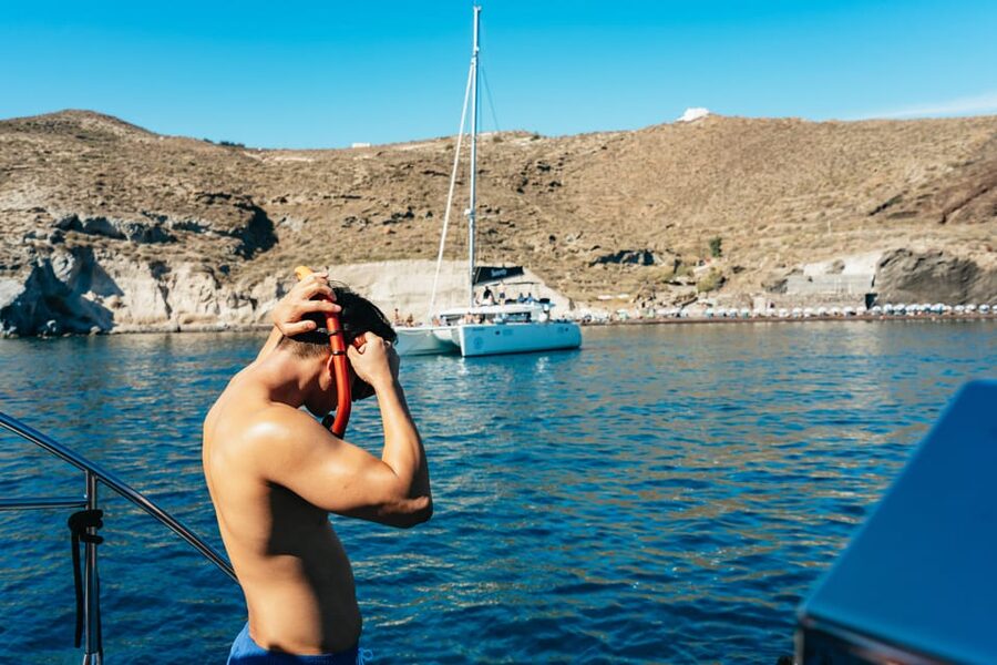Santorini: Sailing Catamaran Cruise with BBQ and Drinks - Morning swimming or an Aegean sunset