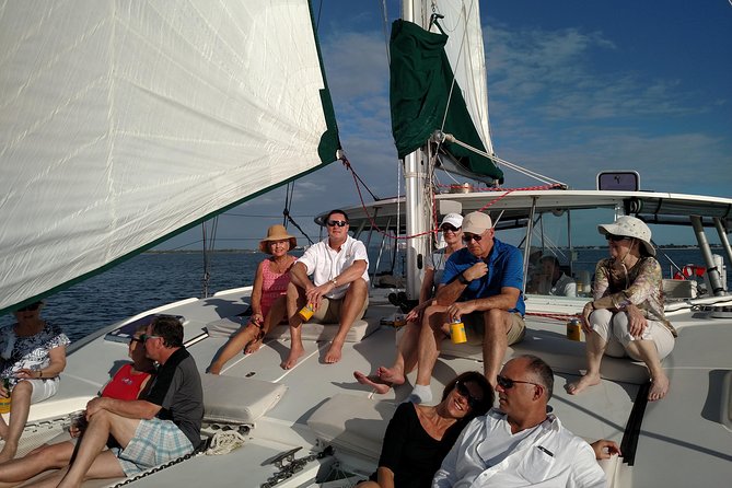 Sightseeing and Sunset Catamaran Sailing Excursion - Drinks, music, and the mood onboard
