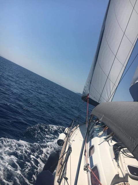 Skiathos: day sailing trip with swim stops and lunch - Sailing between Skiathos, Skopelos, Arkos, and Tsougkrias
