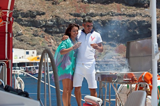 Sunset Sailing Catamaran Cruise in Santorini with BBQ and Drinks - Hot Springs near Palea Kameni