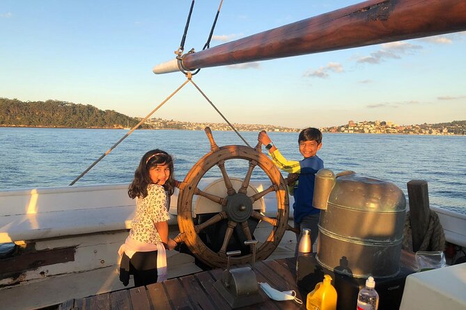 Sydney Harbour Tall Ship Afternoon Discovery Cruise - Raising the sails with the crew